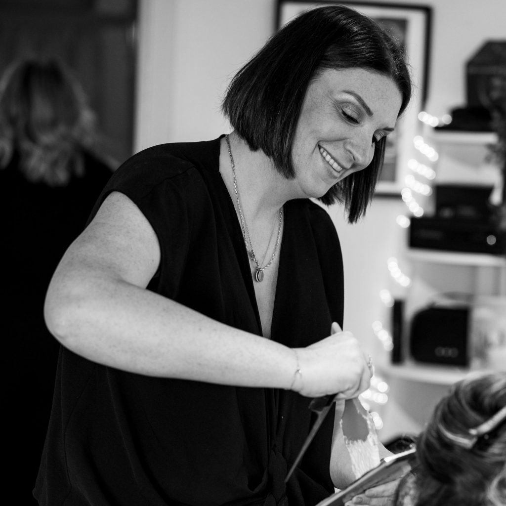 Susan Collins doing hair